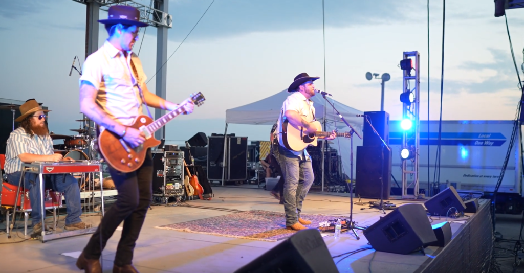 Tyler Anthony and The Trainwrecks perform on stage at HyVee IndyCar Weekend